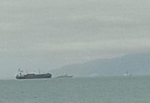 Amid political turmoil in Haiti, U.S. warship arrives off coast of Port-au-Prince