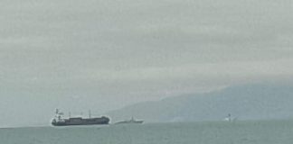 Amid political turmoil in Haiti, U.S. warship arrives off coast of Port-au-Prince