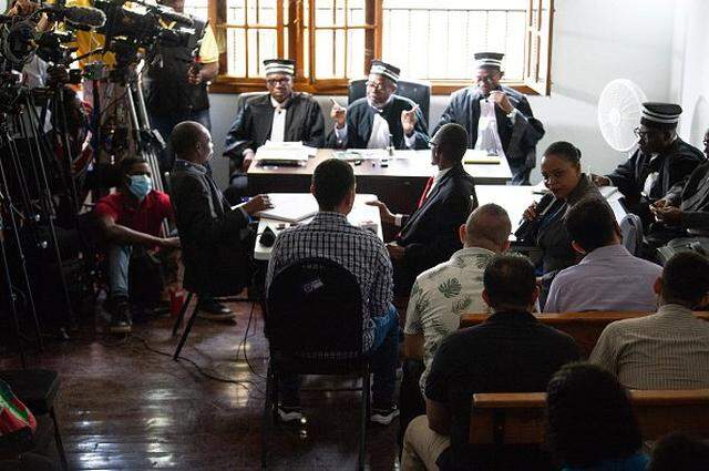 Colombian men accused of involvement in the assassination of former Haitian President Jovenel Moise, attend a hearing at the Court of Appeals in Port-au-Prince, Haiti, on June 16, 2025. Haitian president Jovenel Moise was assassinated on July 7, 2021 in his Port-au-Prince residence. Haitian president Jovenel Moise was assassinated on July 7, 2021 in his Port-au-Prince residence. (Photo by Clarens SIFFROY / AFP) (Photo by CLARENS SIFFROY/AFP via Getty Images)